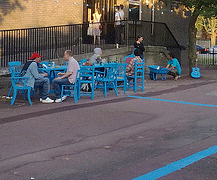 People sitting at dinner for eight table
