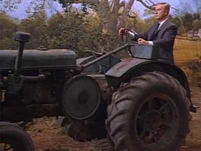 Eddie Albert on a tractor